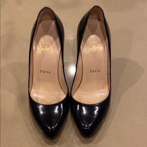 Christian Louboutin black pumps